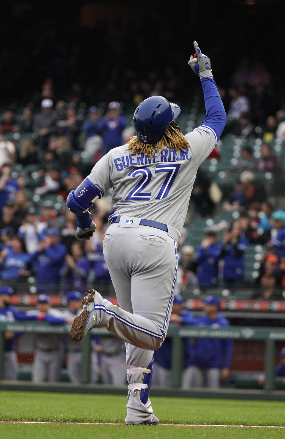 Toronto Blue Jays' Vladimir Guerrero Jr. points to the sky as he rounds the bases after hitting a solo home run against the San Francisco Giants during the first inning of a baseball game in San Francisco, Tuesday, May 14, 2019. (AP Photo/Tony Avelar)