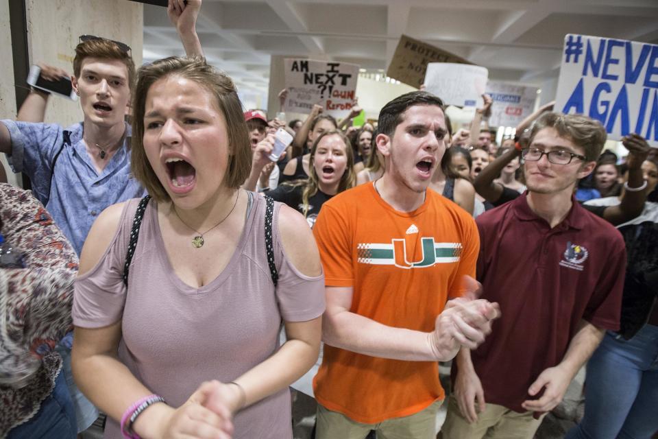 Students chant protest outside the Florida House of Representatives chamber: AP