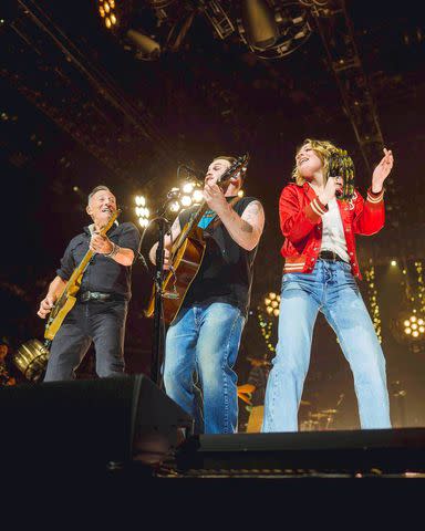 <p>Barclays Center/Instagram</p> Maggie Rogers performing at Barclays Center in Brooklyn in March with Bruce Springsteen (left) and Zach Bryan