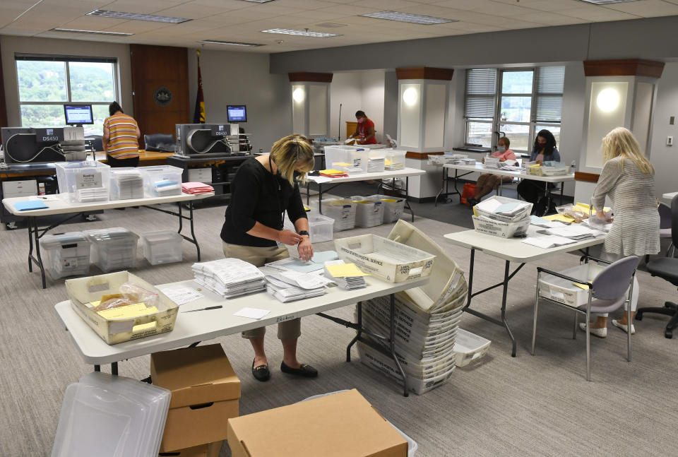 Election workers in Reading, Pennsylvania, open mail-in and absentee ballots on June 3. (Photo: Ben Hasty/MediaNews Group/Reading Eagle via Getty Images)