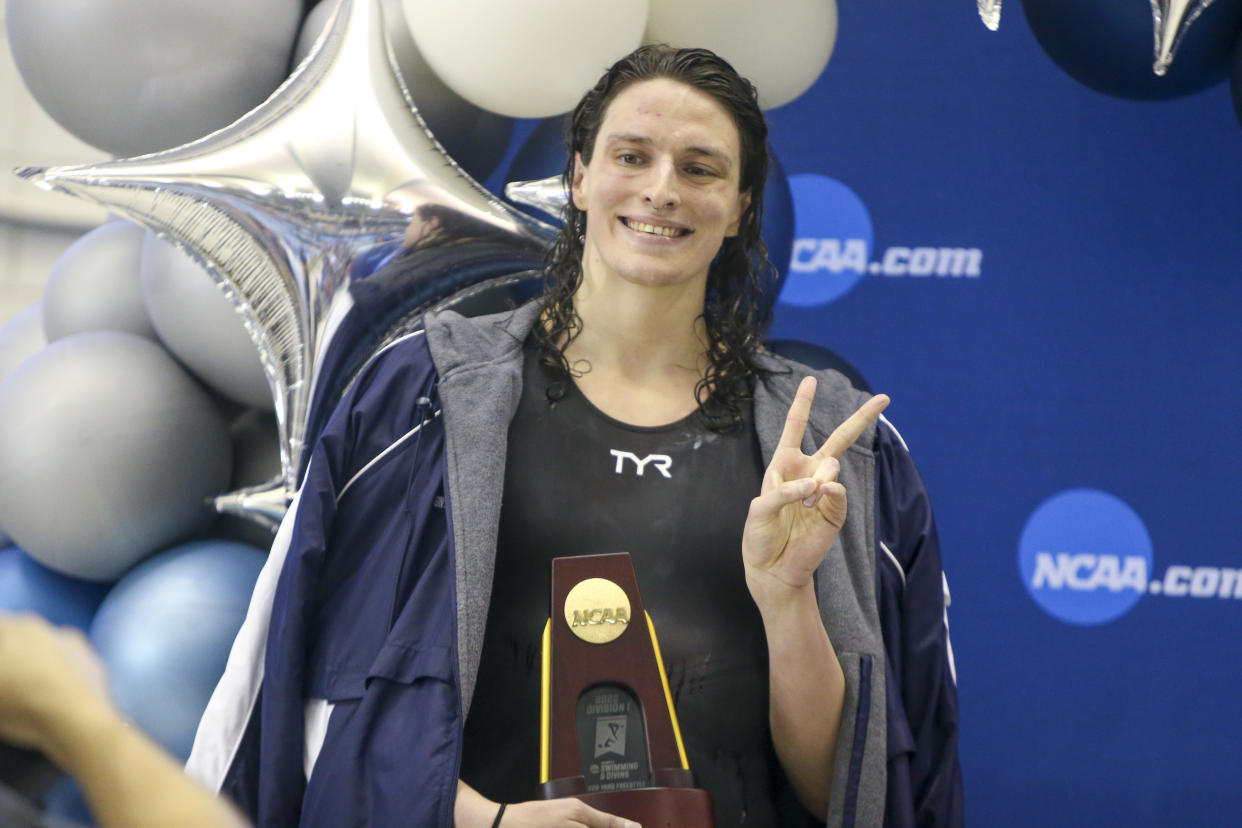 Mar 17, 2022; Atlanta, Georgia, USA; Penn Quakers swimmer Lia Thomas holds a trophy after finishing first in the 500 free at the NCAA Womens Swimming & Diving Championships at Georgia Tech. Mandatory Credit: Brett Davis-USA TODAY Sports