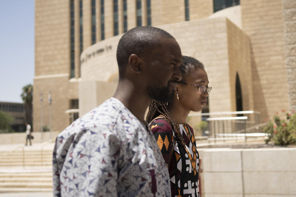 Members of the African Hebrew Israelites of Jerusalem community Yahlital Hercules, right, and Ashriel Moore react to a hearing in the District Court in Beersheba, Israel, on deportation orders for Hercules' family along with dozens of members of the community, Wednesday, July 19, 2023. After years of bureaucratic wrangling, about 500 members hold Israeli citizenship and most of the rest have permanent residency. But a large group now face deportation. Some don't have foreign passports and say they have spent their entire adult lives in Israel and have nowhere to go. (AP Photo/Maya Alleruzzo)