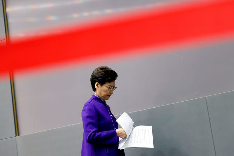 Hong Kong Chief Executive Carrie Lam leaves a news conference after the Legislative Council election in Hong Kong