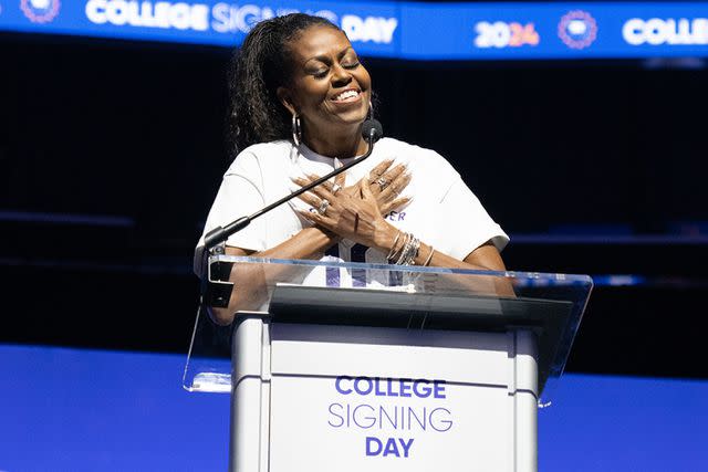 <p>Alexander Vassiliadis Photography</p> Michelle Obama offers encouragement to high school students who are planning to continue their education