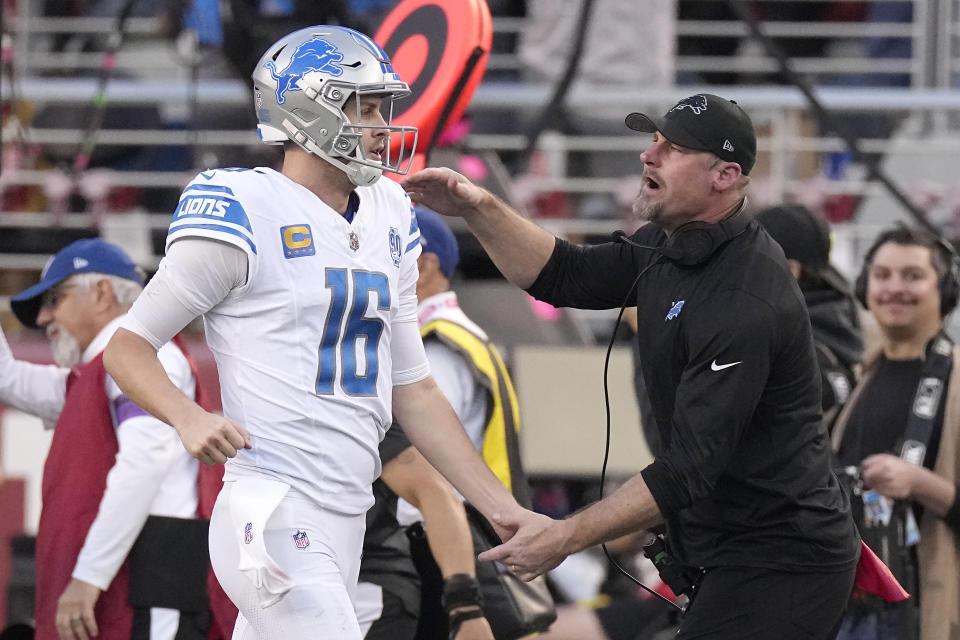 Detroit Lions quarterback Jared Goff (16) celebrates with head coach Dan Campbell during the first half of the NFC Championship NFL football game against the San Francisco 49ers in Santa Clara, Calif., Sunday, Jan. 28, 2024. (AP Photo/Mark J. Terrill)