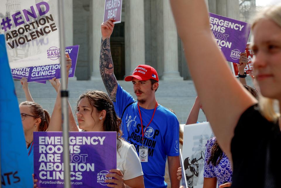 Anti-abortion protestors demonstrate outside the U.S. Supreme Court as they wait for a ruling on an abortion case to be delivered by the Court, in Washington, U.S., June 20, 2024. REUTERS/Evelyn Hockstein