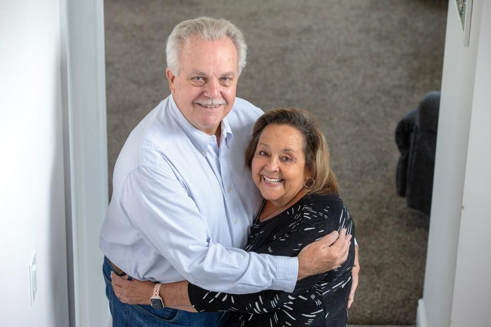 Michele Corcione of Toms River, who received a lung transplant in 2023, hugs her husband, Jeff, at their home in Toms River, NJ Thursday, April 24, 2024.