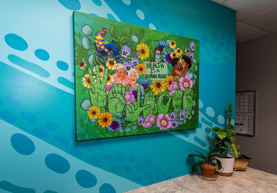 A mural painted by artist John Kowalczyk is located inside the Cudahy Health Department as seen on Tuesday, August 16, 2022.