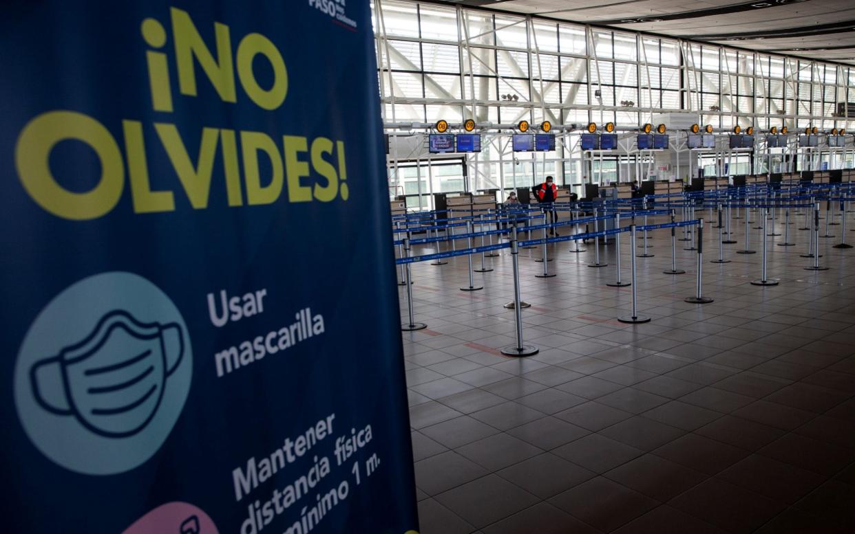 Arturo Merino Benitez International Airport in Santiago, Chile, stands almost empty on Monday after the borders were closed following a surge in Covid cases - Alberto Valdes/EPA-EFE/Shutterstock