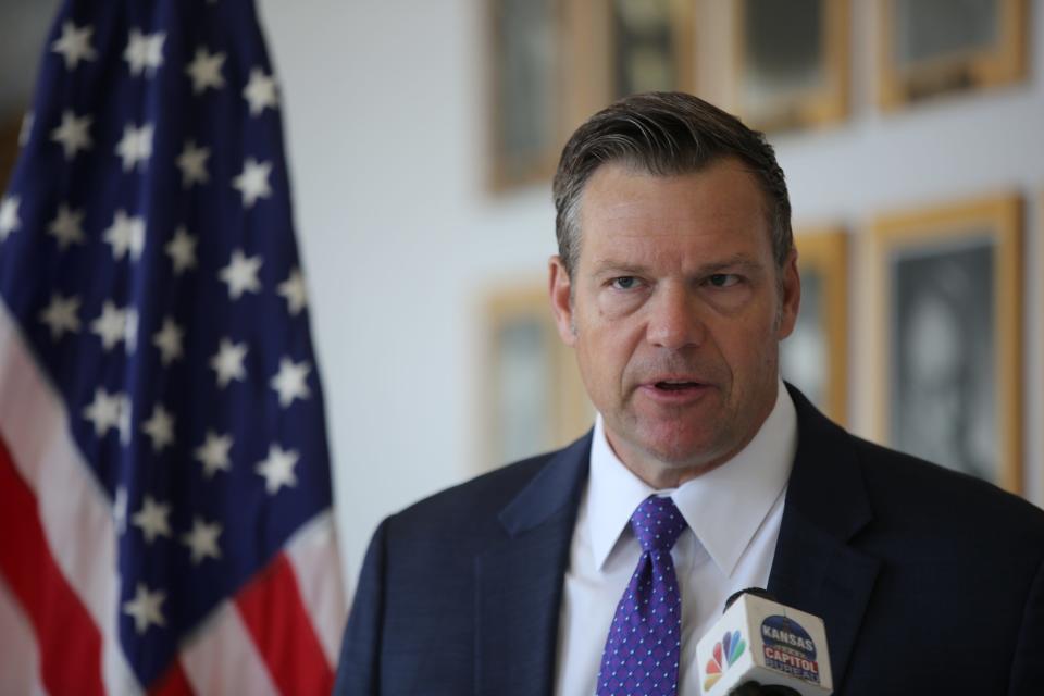 Attorney General Kris Kobach said he fired law firm Morgan & Morgan due to performance concerns, but the law firm has accused Kobach of playing politics.