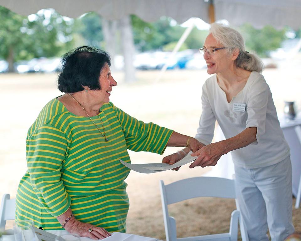 Edna Sullivan, of Quincy, left, received a President's Lifetime Achievement Award for more than 7,284 hours of service, at the American Red Cross, the former Quincy Medical Center and Milton Hospital, from Lois McCallin, of Sharon.