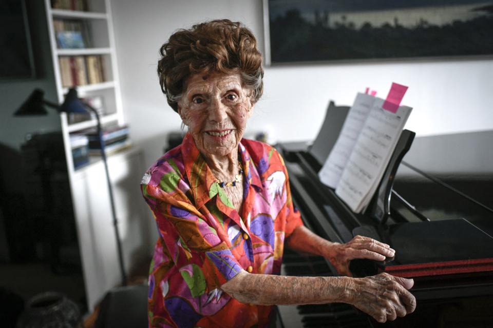 French pianist Colette Maze, born in June 1914, poses at a piano during a photo session in Paris on March 24, 2023. (Photo by Stéphane DE SAKUTIN / AFP) (Photo by STEPHANE DE SAKUTIN/AFP via Getty Images)