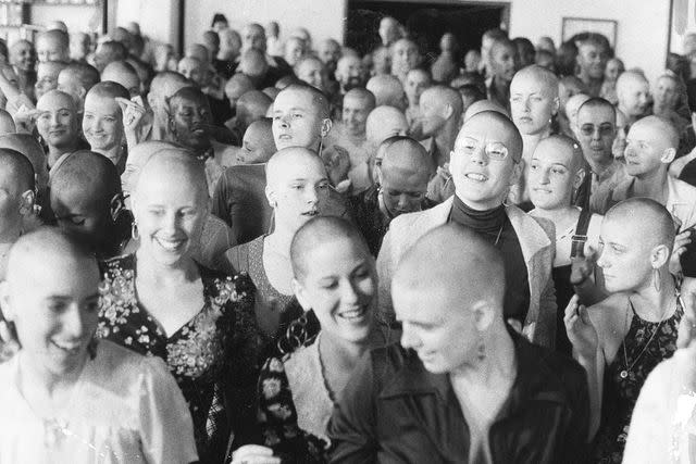 <p>Vince Maggiora/San Francisco Chronicle via Getty</p> Synanon women shave their head as part of a liberation in 1975.