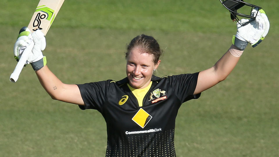 Seen here, Aussie batter Alyssa Healy celebrates a batting milestone during a match.