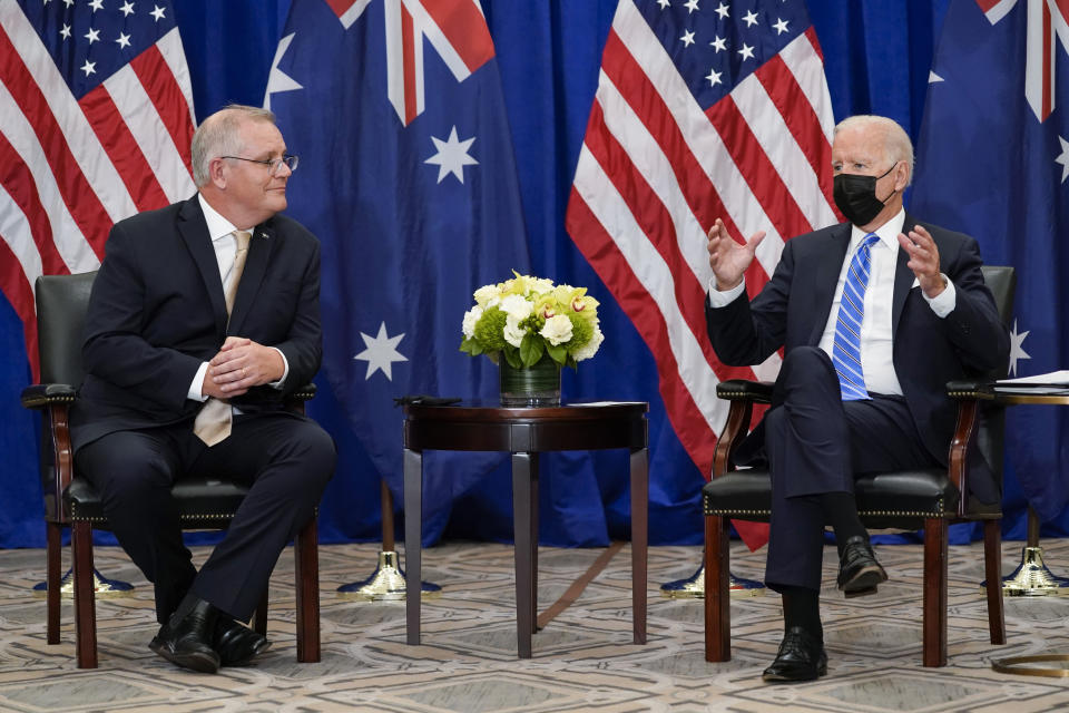 FILE - In this Sept. 21, 2021, file photo President Joe Biden meets with Australian Prime Minister Scott Morrison at the Intercontinental Barclay Hotel during the United Nations General Assembly in New York. Biden is set to host the first ever in-person gathering of leaders of the Indo-Pacific alliance known as "the Quad” on Friday, wrapping up a tough week of diplomacy in which he faced no shortage of criticism from both allies and adversaries. (AP Photo/Evan Vucci, File)