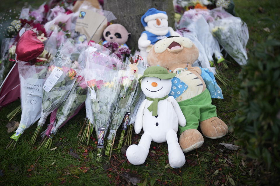 SOLIHULL, ENGLAND - DECEMBER 12: Flowers are left near the scene after three young boys died when a number of children fell through ice on a lake, on December 12, 2022 at Babbs Mill Park in Solihull, England. Three boys aged eight, 10 and 11 have died after falling through an icy lake last night. The search continued for more potential victims, following reports more children were present on the ice at the time of the incident. (Photo by Christopher Furlong/Getty Images)