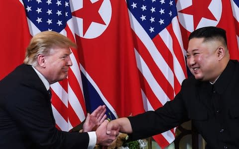 Kim Jong-un meets President Trump in Hanoi in February  - Credit: Saul Loeb/AFP