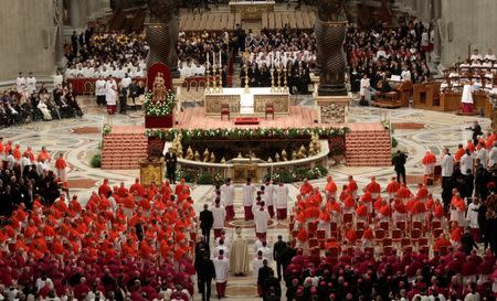 FILE PHOTO: Pope Francis arrives to lead a consistory ceremony to install 17 new cardinals in Saint Peter's Basilica at the Vatican November 19, 2016. REUTERS/Gregorio Borgia/Pool