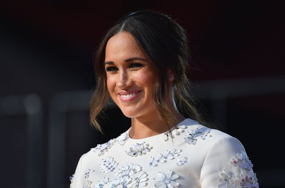 Meghan Markle discussed the fear of being single with Mindy Kaling (AFP via Getty Images)