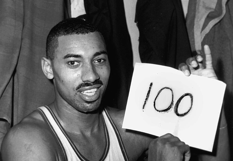 Wilt Chamberlain's 100-point game stands among the NBA's greatest records. (AP Photo/Paul Vathis, File)