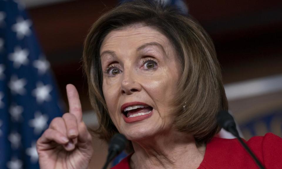 Speaker of the House Nancy Pelosi talks to reporters on the morning after the first public hearing in the impeachment probe of President Donald Trump.