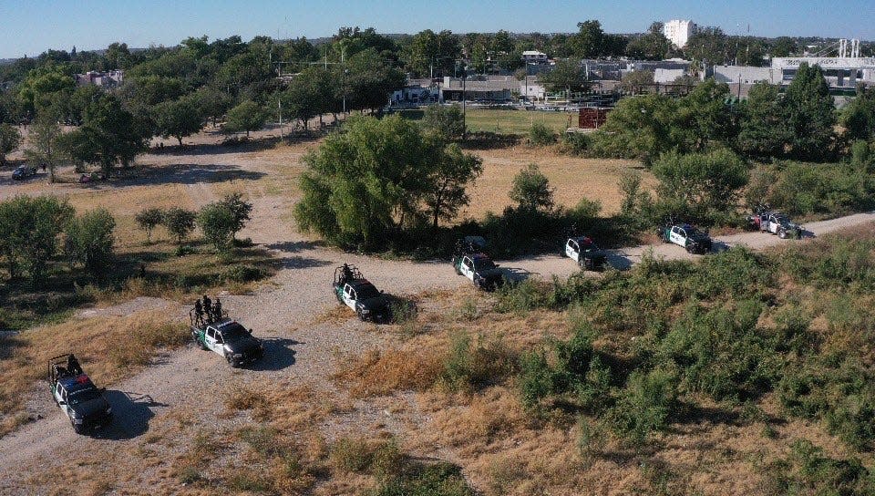 Mexican authorities began staging at a migrant camp on the south side of the Rio Grande in Ciudad Acuña at 6 a.m. Thursday, even as they allowed some migrants to continue to cross north to Del Rio, Texas.