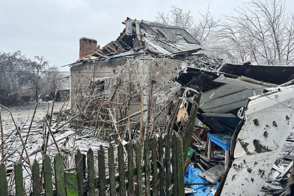 In this photo provided by the Ukrainian Emergency Service, a view of private houses damaged by a Russian missile attack in Novomoskovsk, near Kryvyi Rih, Ukraine, Monday, Jan. 8, 2024. (Ukrainian Emergency Service via AP)