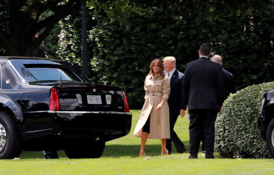 U.S. first lady Melania Trump heads to the presidential limo with President Donald Trump.