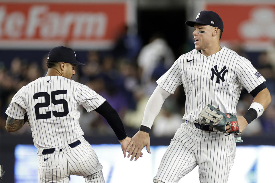 New York Yankees outfielder Aaron Judge celebrates with Gleyber Torres (25) after the Yankees defeated the Houston Astros in a baseball game Wednesday, May 8, 2024, in New York. (AP Photo/Adam Hunger)