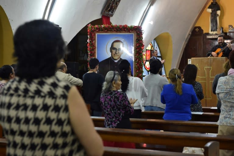 Catholic faithfuls attend to a mass in honor of blessed Monsignor Oscar Romero, at the Divina Providencia parish in San Salvador on October 13, 2018, on the eve of his canonization