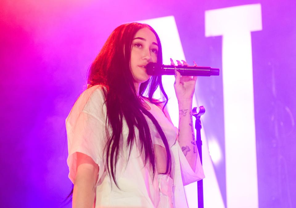 Noah Cyrus is apologizing after a social media post of hers defending Harry Styles was criticized as racist.
