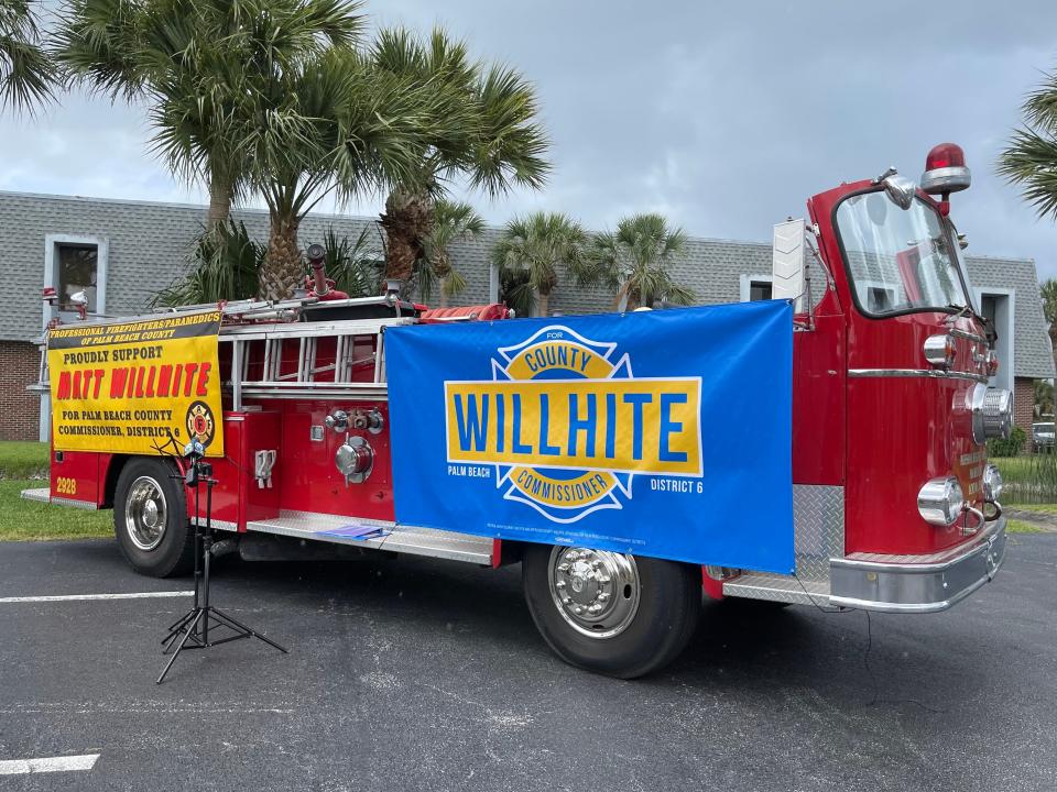 A fire engine, decorated with the campaign logo for state Rep. Matt Willhite's bid for Palm Beach County Commission, sits outside the office of the Professional Firefighters/Paramedics of Palm Beach County in Palm Springs.