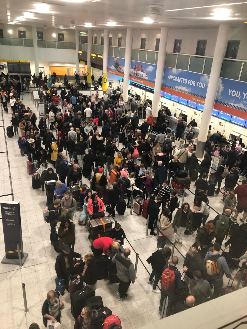 Queues of passengers at Gatwick (Thomas Hornall/PA)