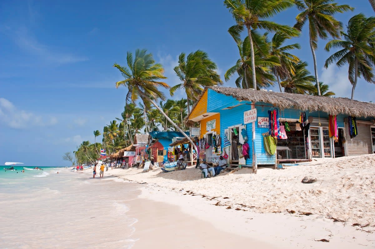 Bavaro Beach has plenty of shops and bars for visitors (Getty Images)