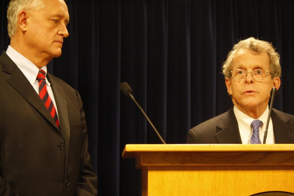 Joe Deters and Mike DeWine at a press conference in 2015.