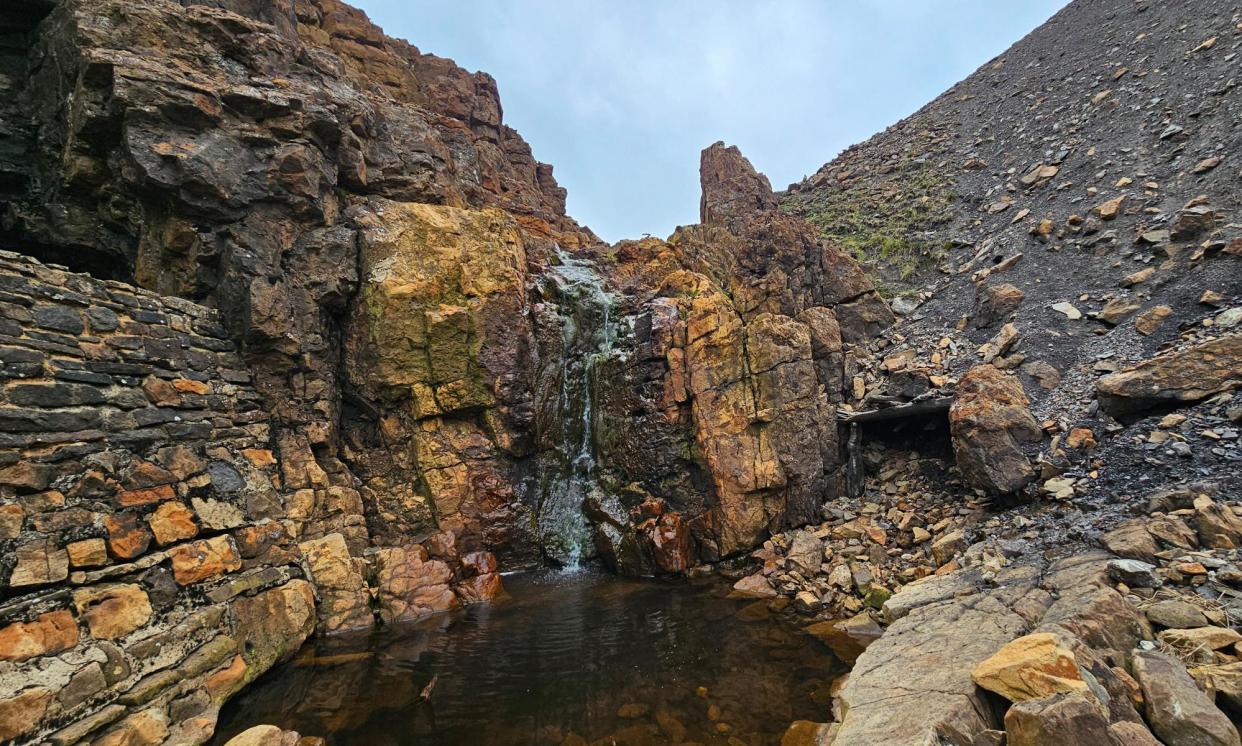 <span>The pool is both fascinating and forbidding, much like the altered landscape that surrounds it.</span><span>Photograph: Susie White</span>