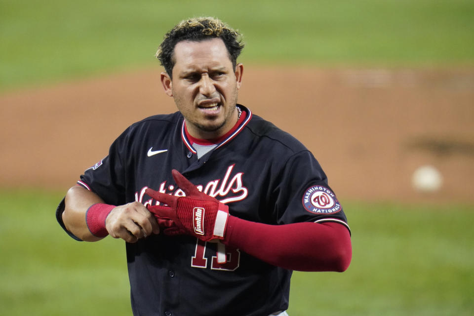Washington Nationals' Asdrubal Cabrera reacts after striking out swinging against Baltimore Orioles starting pitcher Asher Wojciechowski to end to top of the first inning of a baseball game, Saturday, Aug. 15, 2020, in Baltimore. (AP Photo/Julio Cortez)