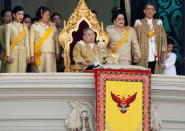 Thailand's King Bhumibol Adulyadej is accompanied by Queen Sirikit (3rd R), Crown Prince Maha Vajiralongkorn (2nd R), Princess Maha Chakri Sirindhorn (2nd L), Princess Chulabhorn (L) and other members of the royal family as he delivers his birthday speech from the balcony of the Grand Palace in Bangkok, Thailand December 5, 2011. REUTERS/Stringer/File Photo