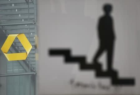 A metro sign stands in front of the headquarters of the Commerzbank AG in Frankfurt November 20, 2014. REUTERS/Kai Pfaffenbach