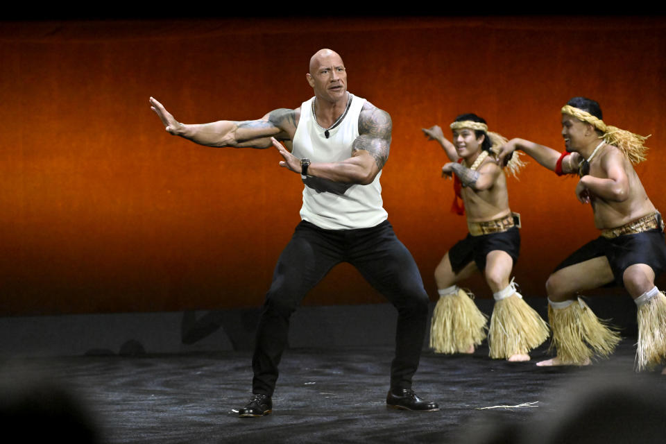 LAS VEGAS, NEVADA - APRIL 11: Dwayne Johnson dances onstage at the Walt Disney Studios Presentation during CinemaCon 2024 at The Colosseum at Caesars Palace on April 11, 2024 in Las Vegas, Nevada.  (Photo by David Becker/WireImage)