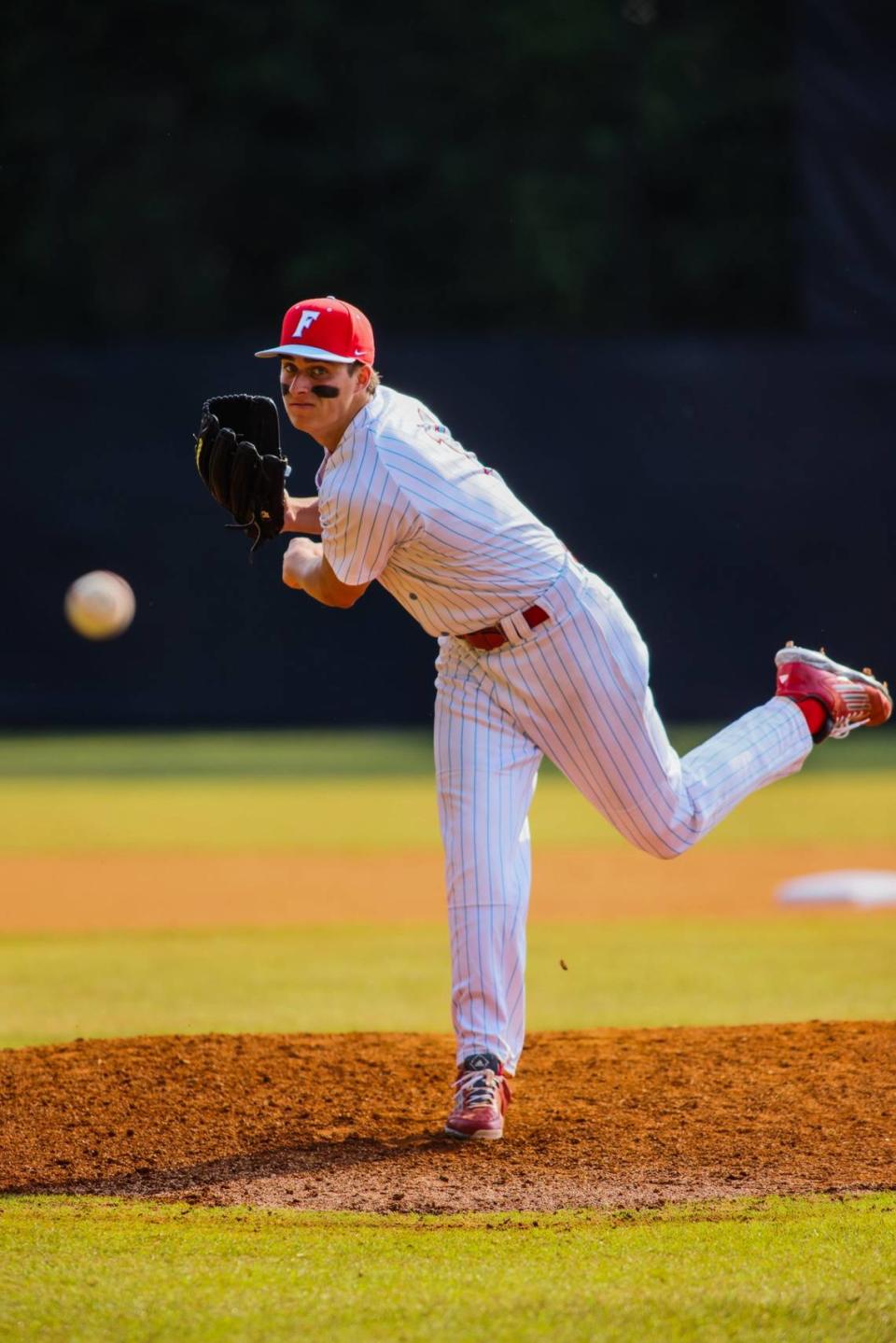 AC Flora pitcher Stephen West throws a pitch during the Class 4A Upper State championship on Wednesday, May 18, 2022.