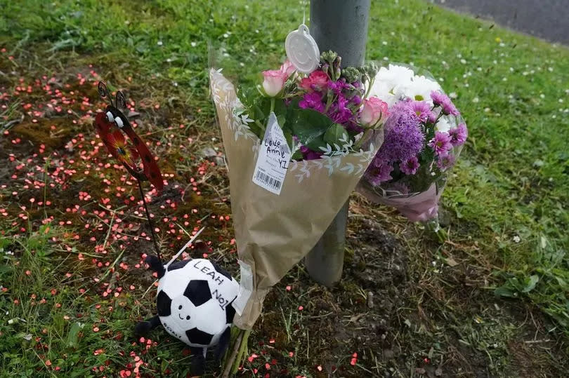 Tributes left at Mount Pleasant Primary School where Leah Harrison was a pupil