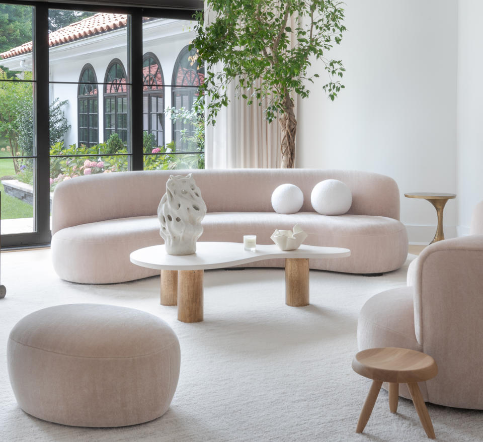 A living room with coffee table candle