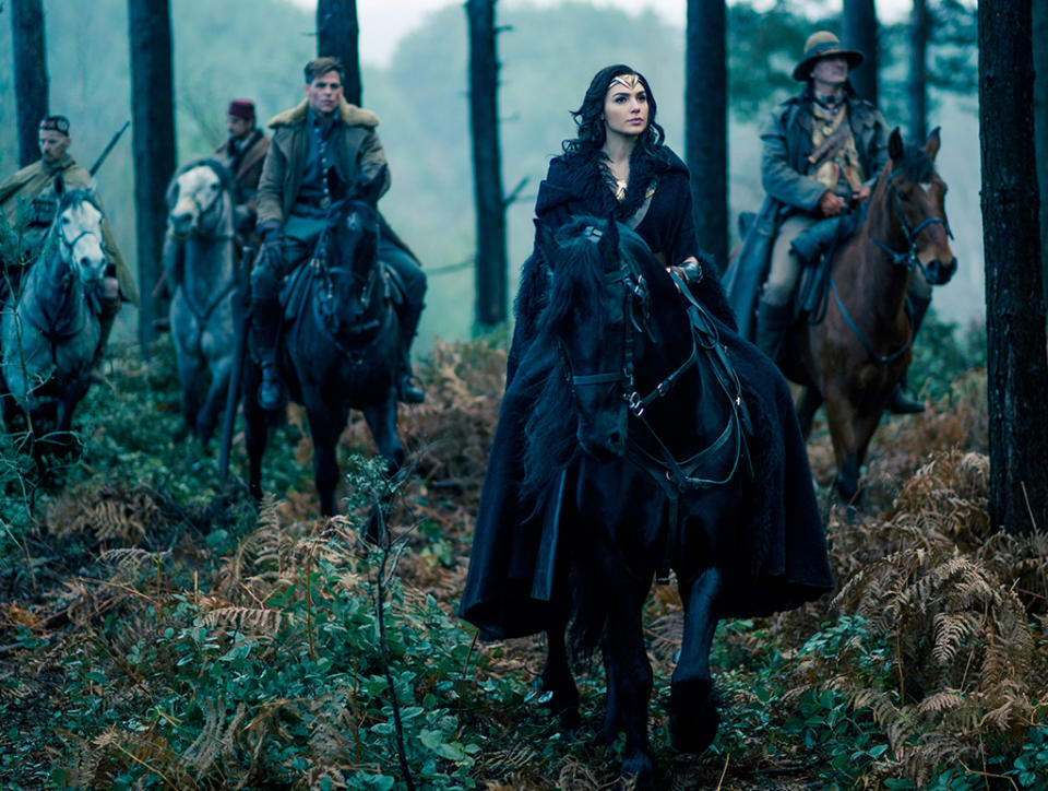 <p>Wonder Woman is accompanied by Charlie, Sameer, Steve, and their scout Chief (Eugene Brave Rock), through German territory. (Photo: Warner Bros.)<br> </p>  <p>No Man’s Land</p><p> Wonder Woman races across the battlefield, ready to storm the German trenches. (Photo: Warner Bros.)<br> </p>  <p>A Moment of Reflection</p><p> Steve tries to convince Diana to listen to his plan. (Photo: Warner Bros.)<br> </p>  <p>Lady in Blue</p><p> Diana certainly knows how to make an entrance to a gala. (Photo: Warner Bros.)<br> </p>  <p>Dance of Doom</p><p> Diana has her sword handy as she looks for an opportunity to strike down the general. (Photo: Warner Bros.)<br> </p>  <p>Reinforcements</p><p> Chief, Charlie, Sameer, and Steve follow Wonder Woman into battle. (Photo: Warner Bros.)<br> </p>  <p>The Team</p><p> Sameer, Steve, Wonder Woman, Chief, and Charlie strike a post-battle pose. The resulting photo will be unearthed decades later by Lex Luthor (in <em>Batman v Superman</em>) and eventually returned to Diana by Bruce Wayne. (Photo: Warner Bros.)<br> </p>