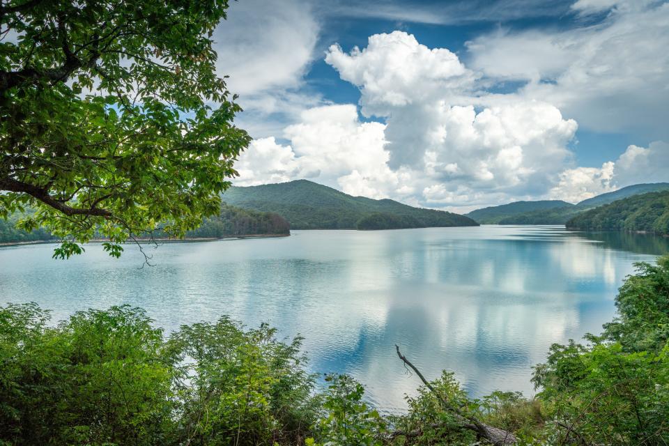 After nearly three decades of lapsed decorations, the park made a commitment in the late 1970s to support these visits across Fontana Lake, which was formed in 1944 when the Little Tennessee River was dammed by the Tennessee Valley Authority, forcing more than a thousand families to relocate.