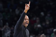 Washington Wizards head coach Wes Unseld Jr. calls to his players during the first half of an NBA basketball game against the Boston Celtics, Wednesday, Oct. 27, 2021, in Boston. (AP Photo/Charles Krupa)