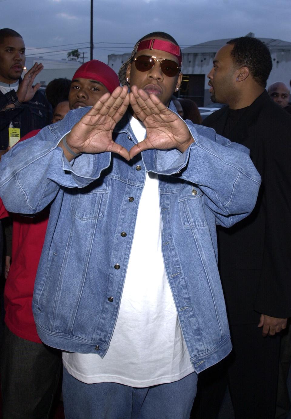 Shawn Corey Carter, professionally known as JAY-Z, was born on Dec. 4, 1969, in New York City. From humble beginnings — growing up in Marcy Projects in Brooklyn — to becoming the first hip-hop artist to amass a <a href="https://people.com/music/jay-z-first-hip-hop-artist-billionaire/" rel="nofollow noopener" target="_blank" data-ylk="slk:billion-dollar fortune;elm:context_link;itc:0;sec:content-canvas" class="link ">billion-dollar fortune</a>, JAY-Z has become a titan in the music industry and a highly successful investor across many fields: liquor, art, real estate, fashion and companies like Uber. In honor of his 50th birthday, take a look back at some of the artist's biggest moments that got him to where he is today.