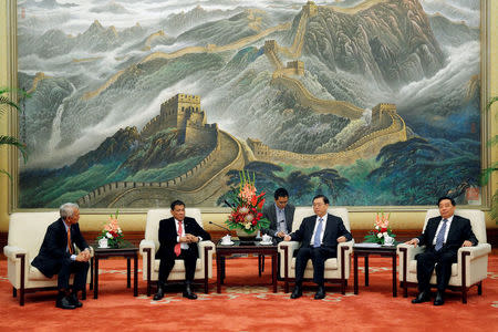 Philippines President Rodrigo Duterte (2-L) and Zhang Dejiang (2-R), Chairman of the Standing Committee of the National People's Congress of China hold a meeting at the Great Hall of the People in Beijing, China, October 20 2016. REUTERS/Wu Hong/Pool