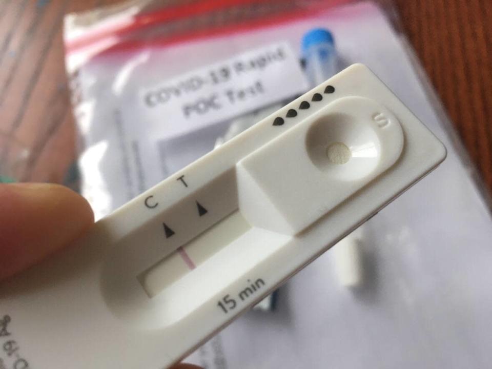 A Germany-made, Canada-distributed COVID-19 home test showing a negative result, pictured on Jan. 10. As COVID-19 cases level off in countries like the United Kingdom, experts in the province say they also anticipate a decline in cases, although when that would be remains unclear.  (David Horemans/CBC - image credit)