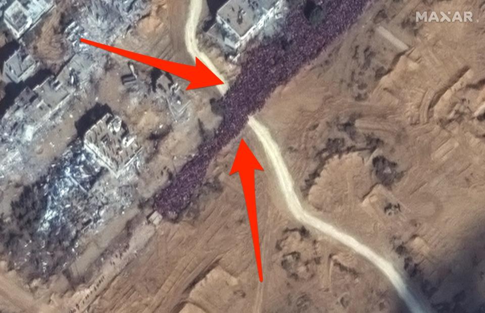 satellite image of crowds trying to flee along road